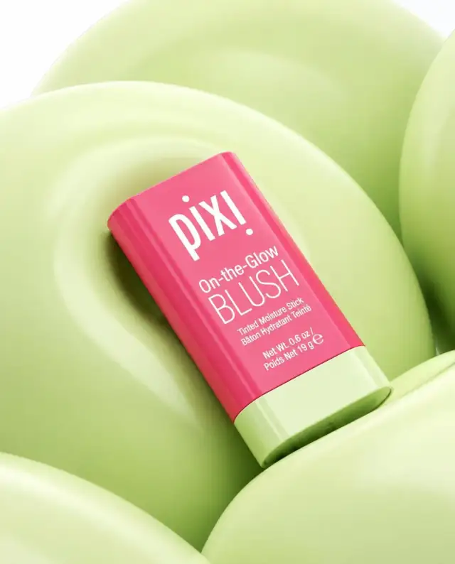 AI-rendered Pixi cosmetics product detail — studio shot of beauty product textures and finish