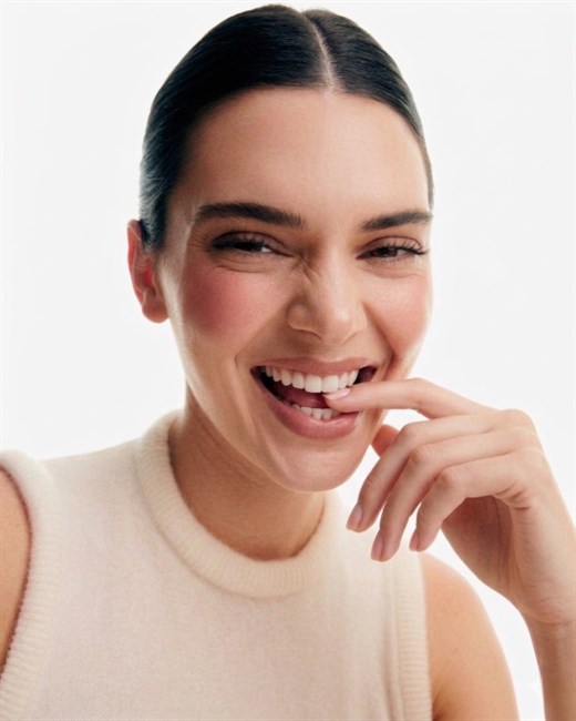 Same model with a soft smile emotion result
